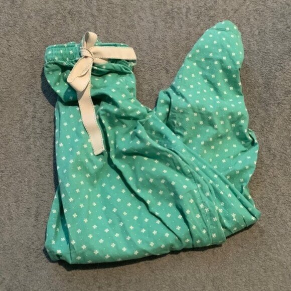 PJ pants personal pijamas with a clover pattern well-worn